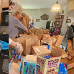 aauw members preparing lunches for St. Andrew's Clinic