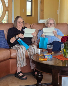 photos of members at the new members tea