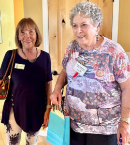 photos of members at the new members tea